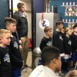 3rd grade Peak boys listening to Coach Omar's pre-game talk 12/7/18